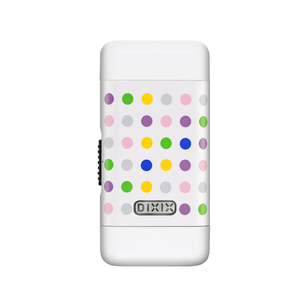 White Dixie cup with colorful polka dots on a white background